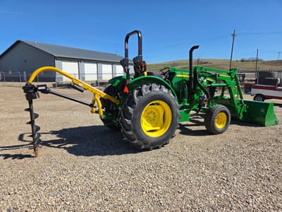 2023 John Deere 5045E Tractor with John Deere 520 Loader, 250 hrs, 3pt, 540 pto, mower, post hole auger, pallet forks, bale spear, bale unroller, quick tach bucket - Image 4