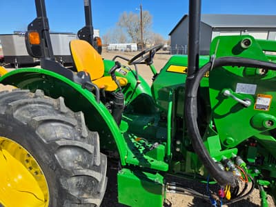 2023 John Deere 5045E Tractor with John Deere 520 Loader, 250 hrs, 3pt, 540 pto, mower, post hole auger, pallet forks, bale spear, bale unroller, quick tach bucket - Image 5