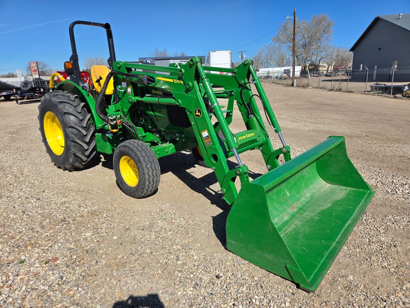 2023 John Deere 5045E Tractor with John Deere 520 Loader, 250 hrs, 3pt, 540 pto, mower, post hole auger, pallet forks, bale spear, bale unroller, quick tach bucket